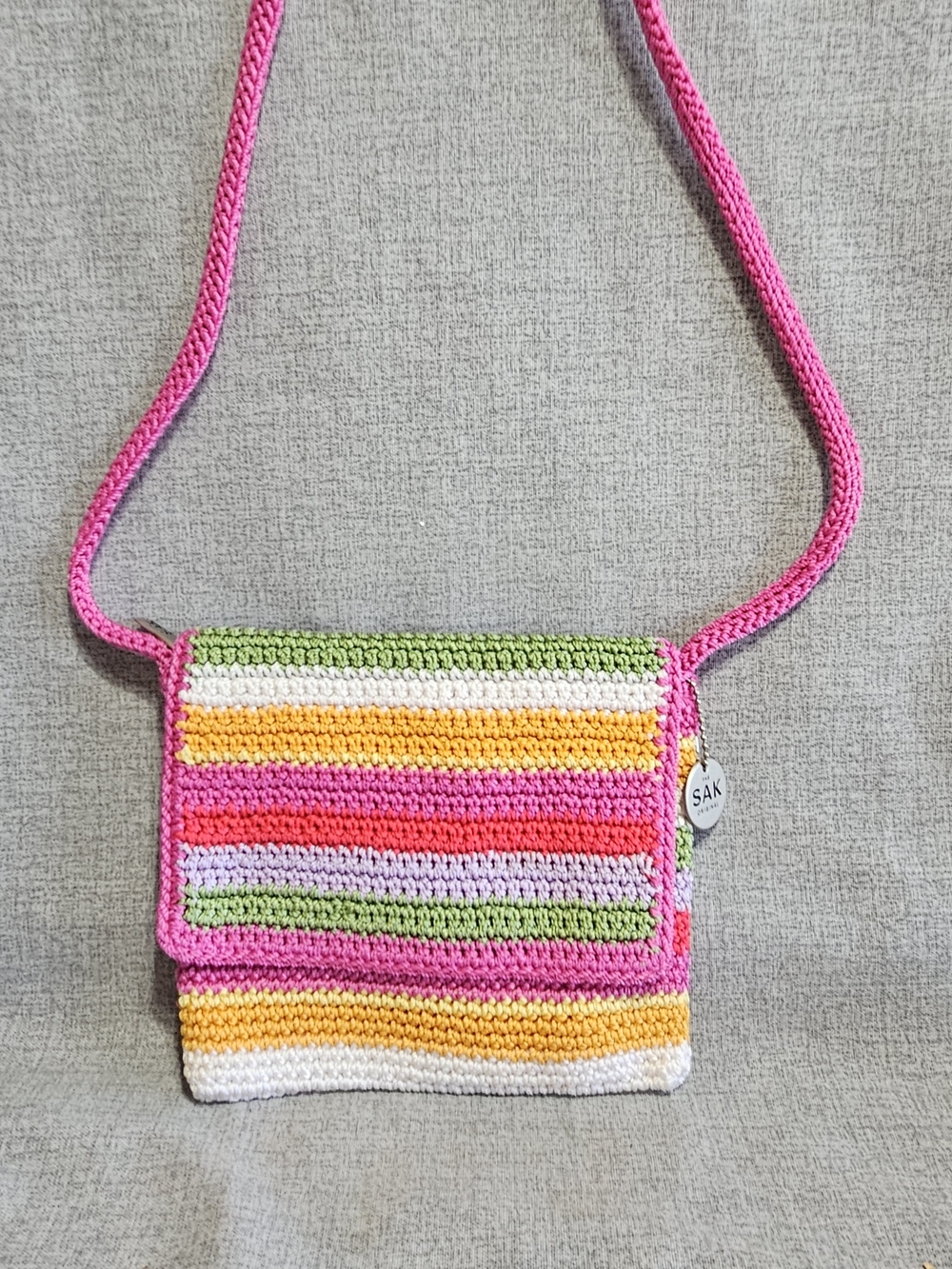 The Sak Crochet Striped Crossbody in Pink, Yellow, Green & White